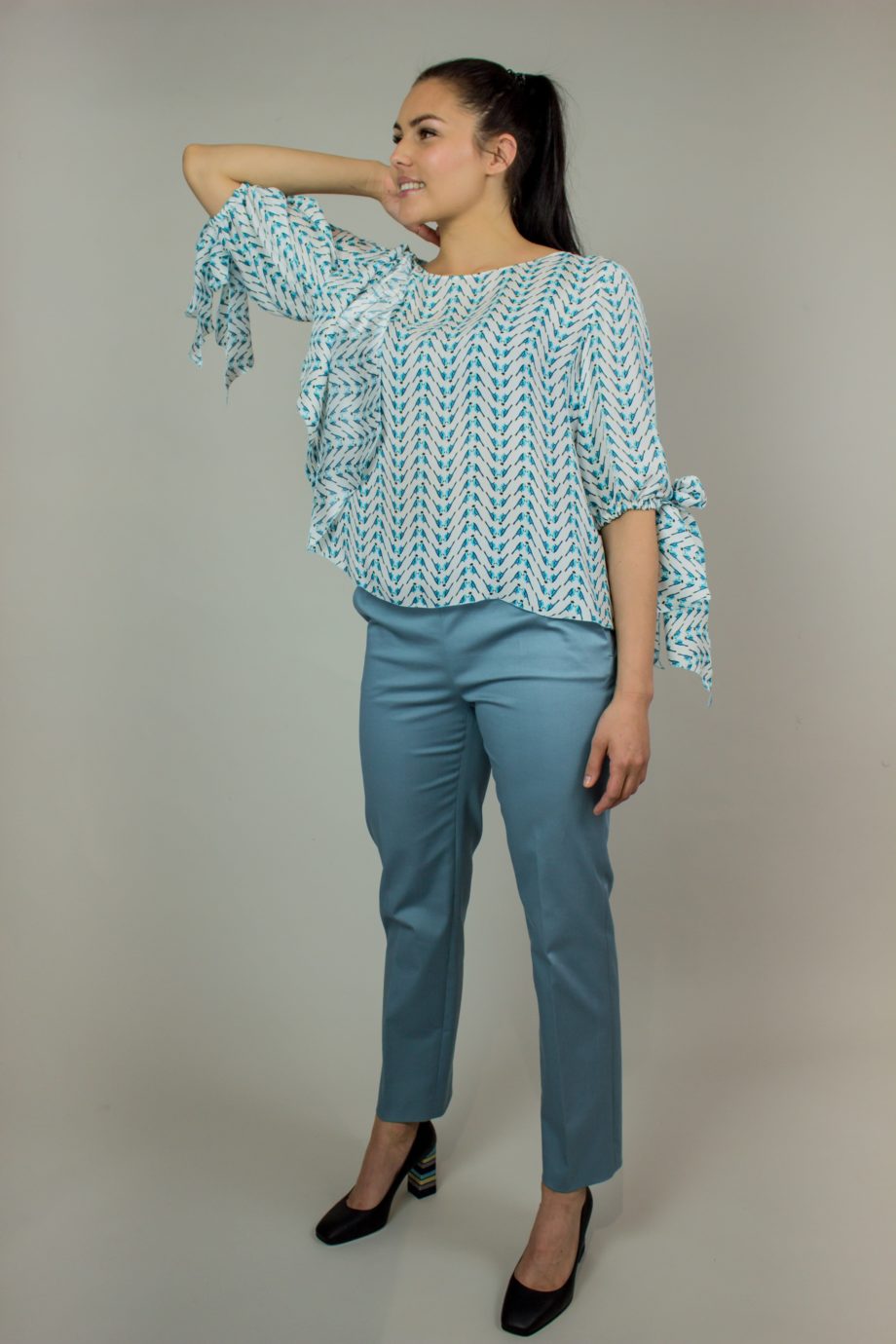 10. KRISTINA TI Turquoise silk blouse