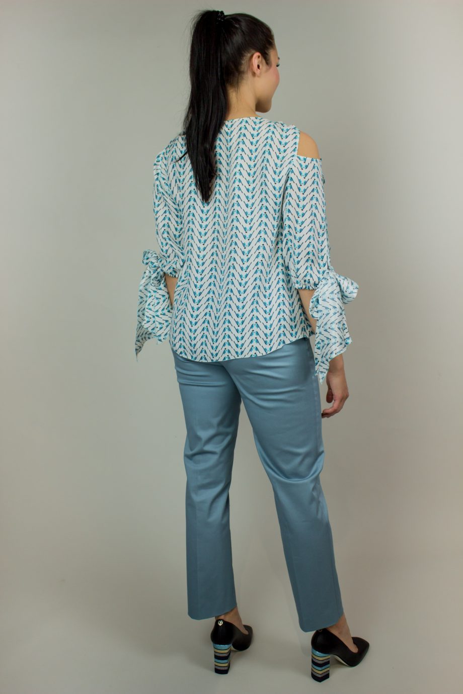 10. KRISTINA TI Turquoise silk blouse