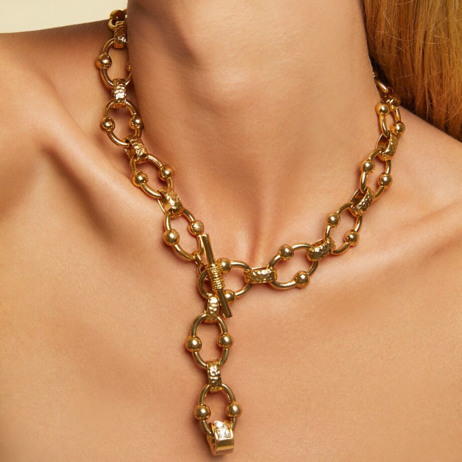 Gas Bijoux gold chain necklace on person
