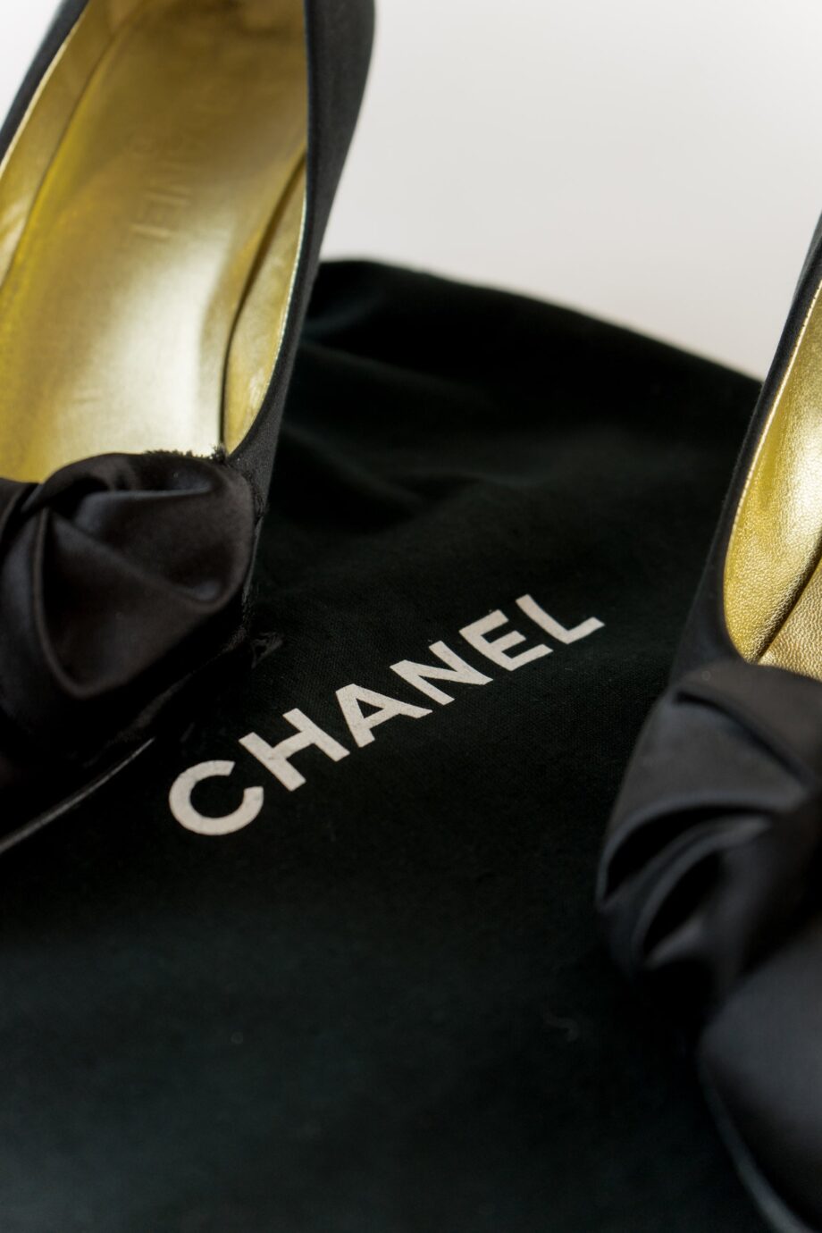 Pre-Loved black Chanel heels with dust bag